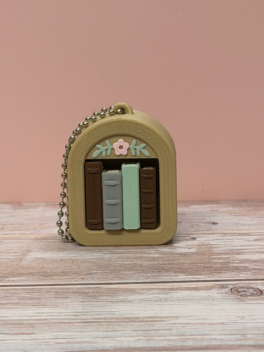Cozy Bookshelf Clicker Keychain