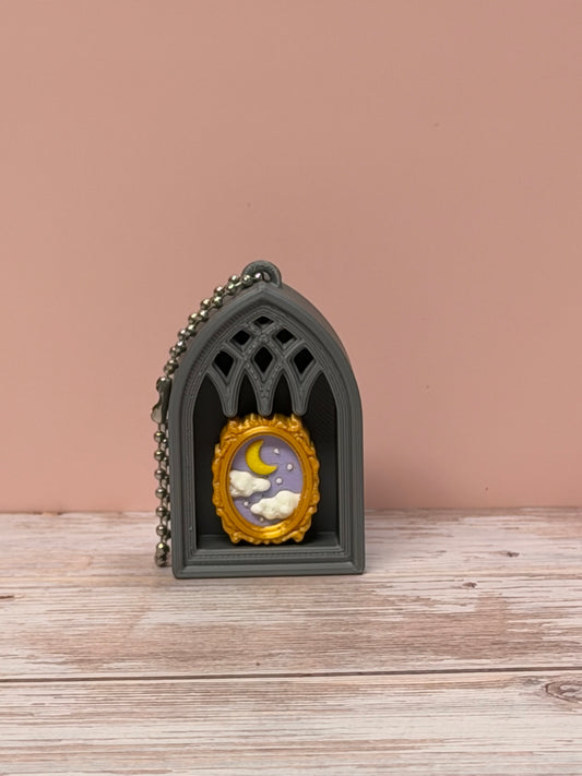 Celestial Portrait Clicker Keychain
