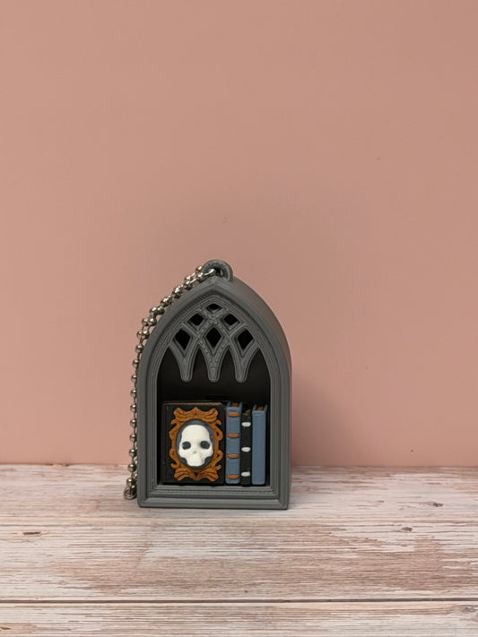 Haunted Library Clicker Keychain