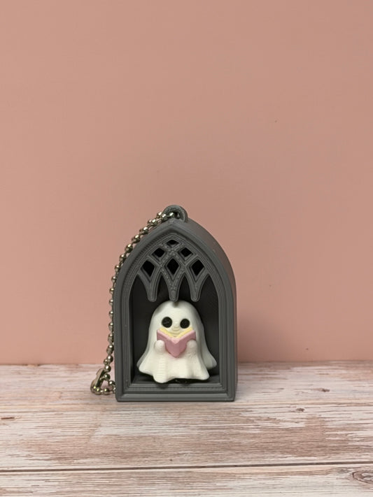 Haunted Reader Clicker Keychain
